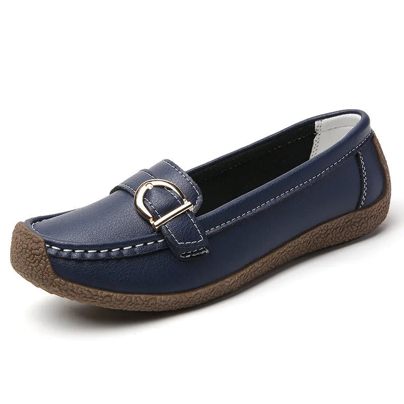 Women's beige casual loafers with a round toe and shallow slip-on design on a soft beef tendon sole.
