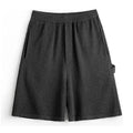 Cement grey straight leg polyester sports shorts with elastic waistband