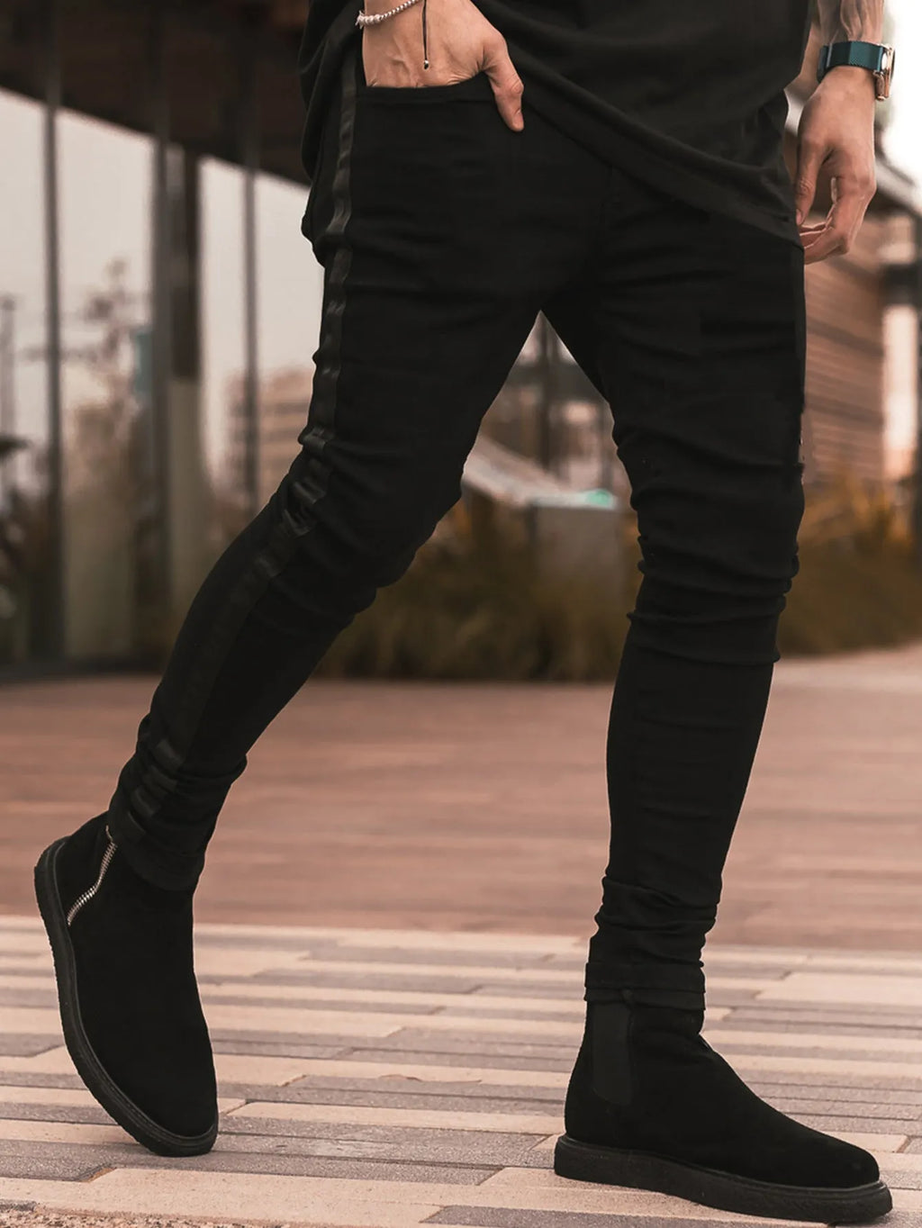 Men's ripped black slim-fit high waist cotton denim trousers with elastic waist