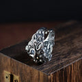 Silver open ring with detailed animal and zodiac modelling in jibeast pattern, retro style