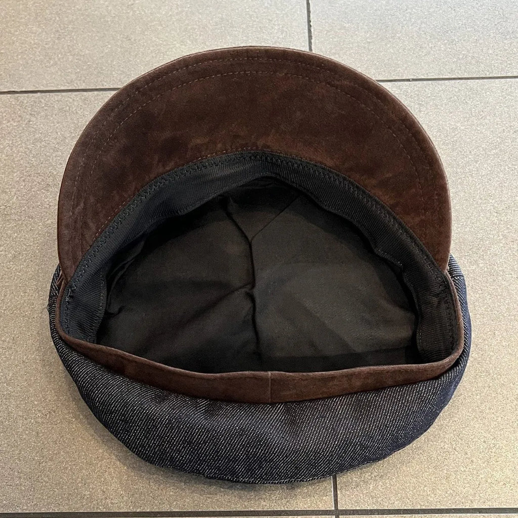Dark blue denim octagonal newsboy hat with adjustable 54-58cm sizing and colour accent brim options