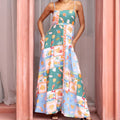 Women's green printed sleeveless flared strap long dress with pockets, polyester fabric