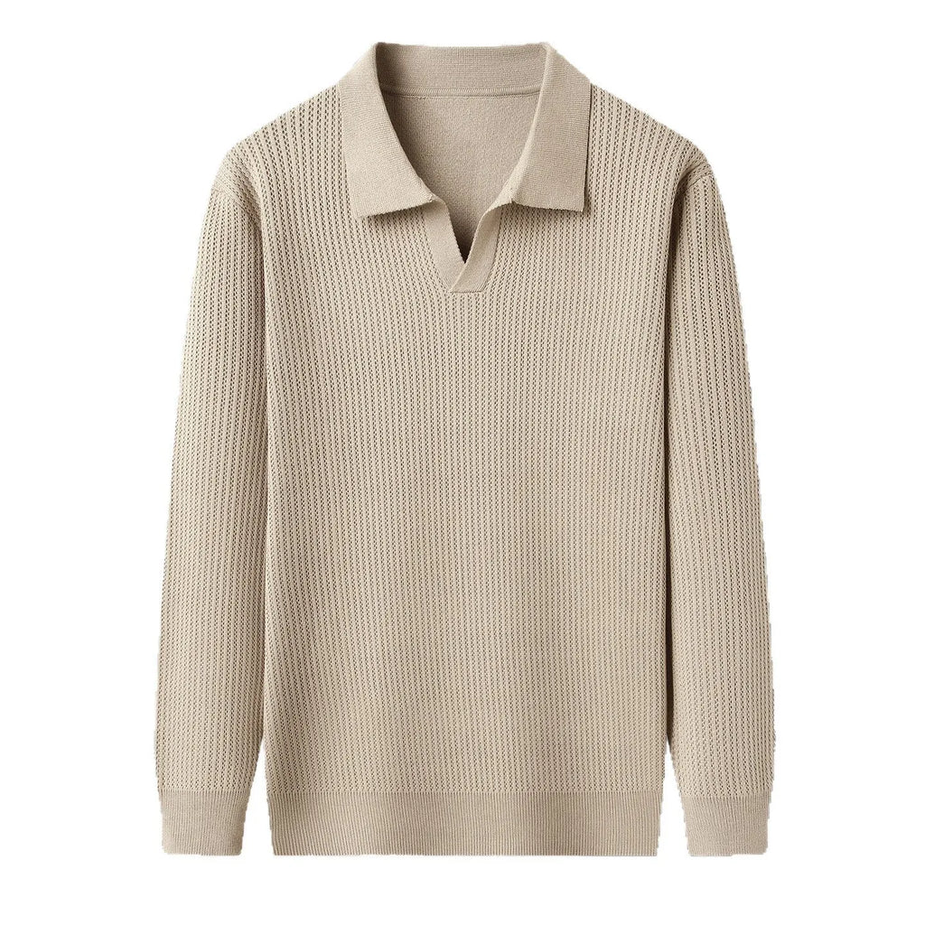 Man wearing a loose-fit camel-coloured pullover sweater, a simple casual knit for autumn.