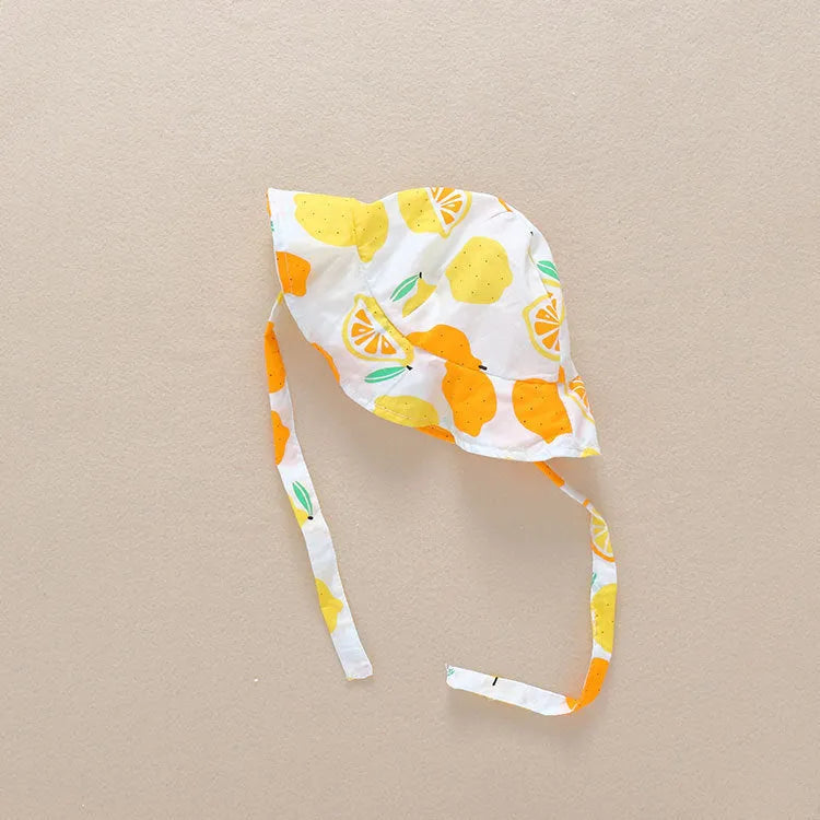 Cotton summer baby romper triangle jumpsuit in yellow with removable hat on white background