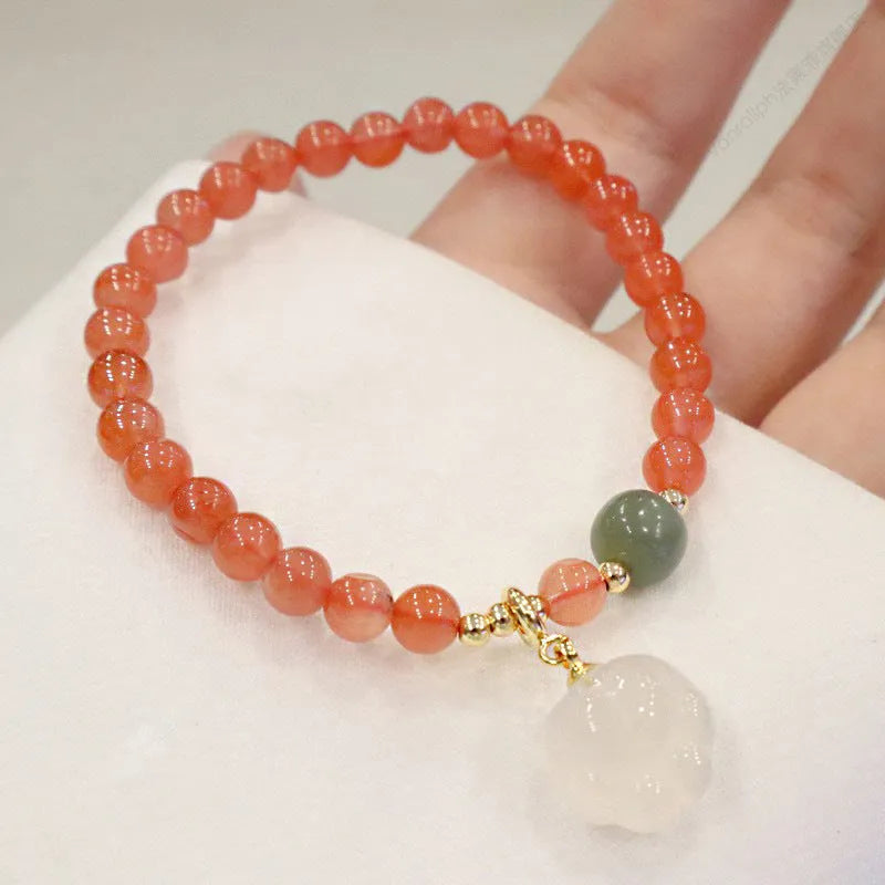 Natural red agate bracelet with jade and cat paw motif polished 6mm beads
