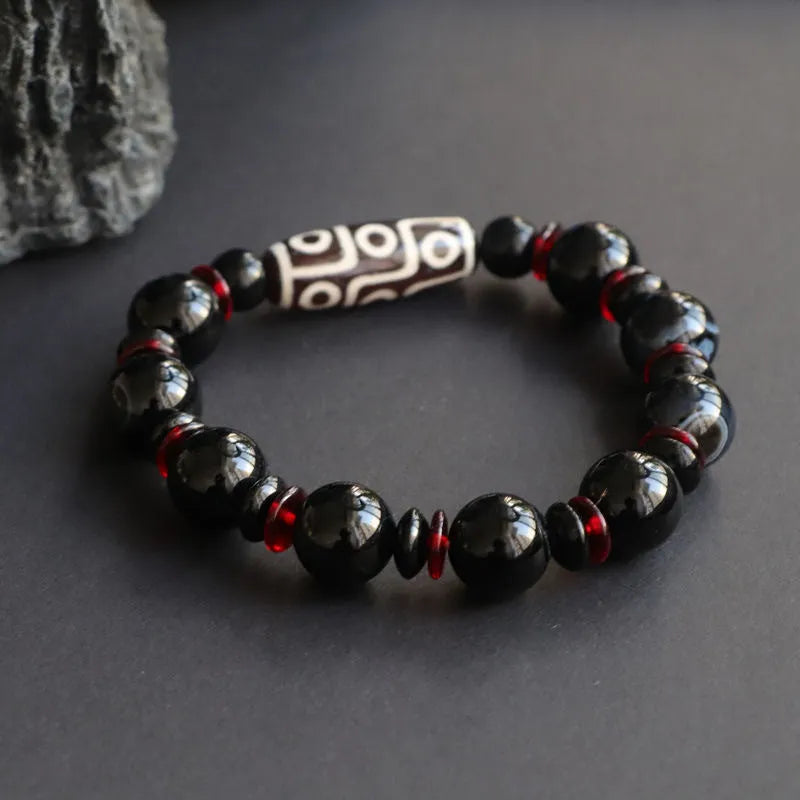 Black agate Dzi bead bracelet with hand-woven geometric pattern in national style design