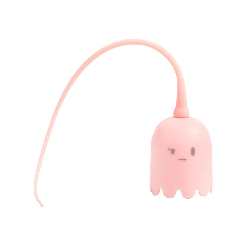 Green automatic cat toy with swinging silicone tails on a white surface
