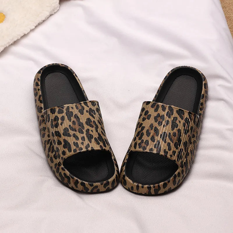 Women's leopard print EVA slippers with thick sole on a white background.