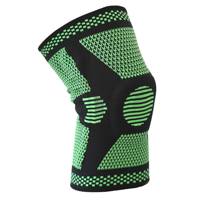 Green silicone spring knee pad for sports, showing polyamide construction and non-slip design on a leg.