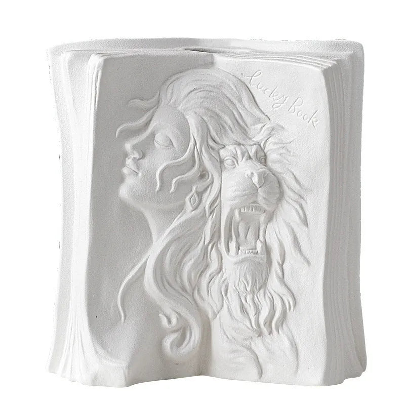 Glazed ceramic book stand in one of four artistic styles: lover, dancer, beauty and beast, or brushed face.