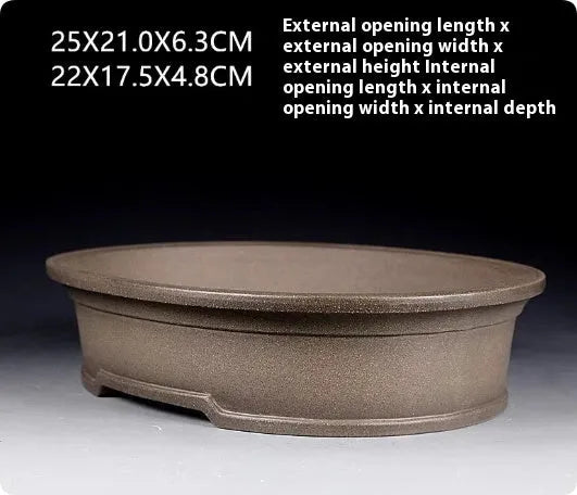 Handmade purple sand ceramic oval bonsai flower pot showing antique finish and 25cm length.