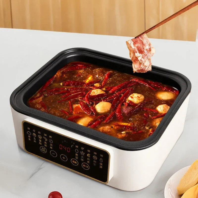 Household electric food steamer with stainless steel rack showing 10-litre capacity and control panel.