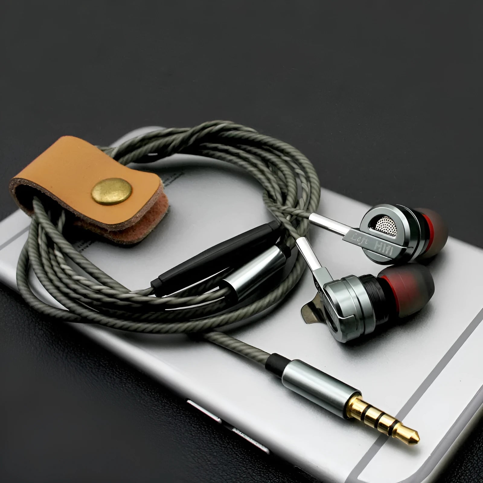 Metal CNC zinc alloy piston in-ear headphones in black or silver with in-line microphone controls.