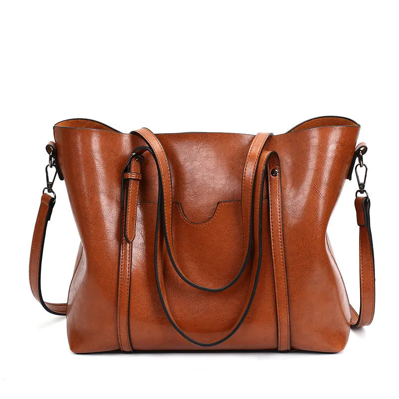 Retro style women's messenger bag in PU leather, shown in light blue colour