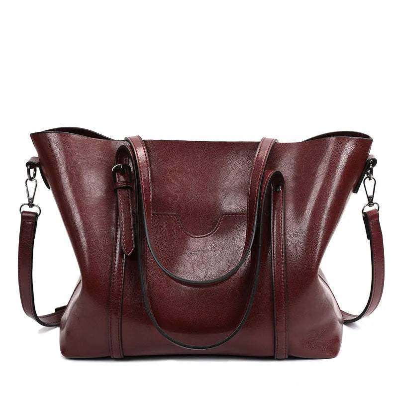 Retro style women's messenger bag in PU leather, shown in light blue colour