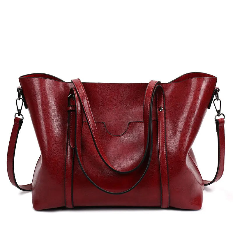 Retro style women's messenger bag in PU leather, shown in light blue colour