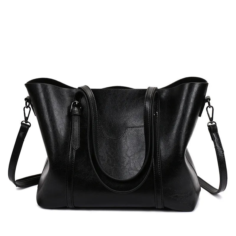 Retro style women's messenger bag in PU leather, shown in light blue colour