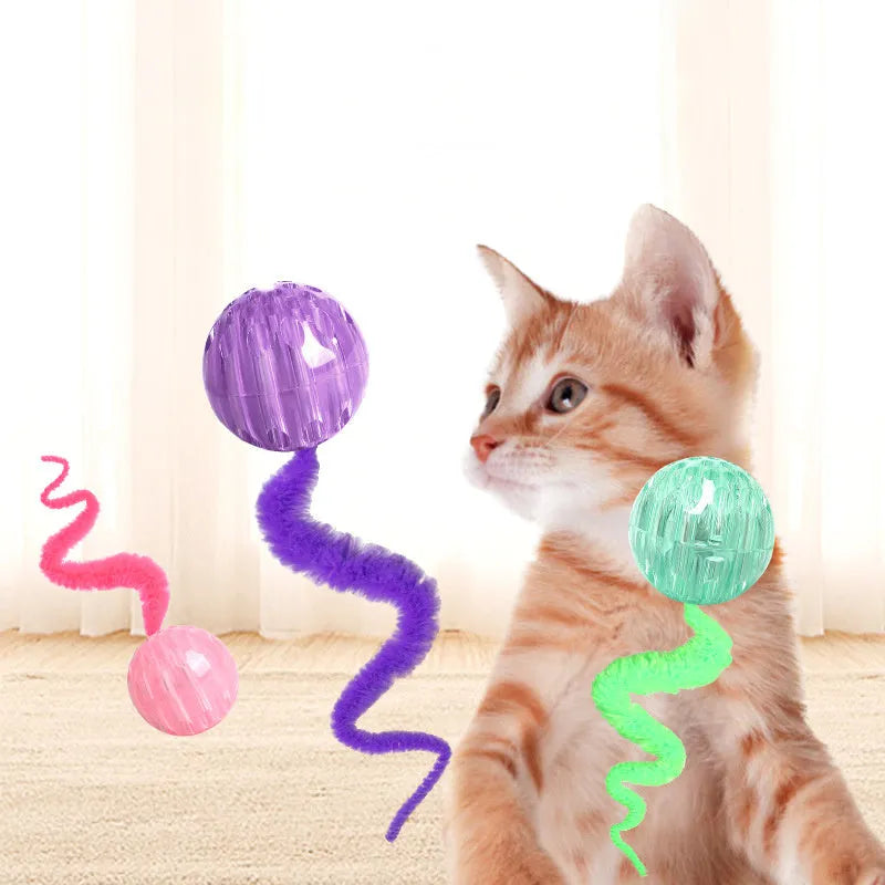 Interactive cat toy with three bouncy TPR balls connected to long plush tail in green colour