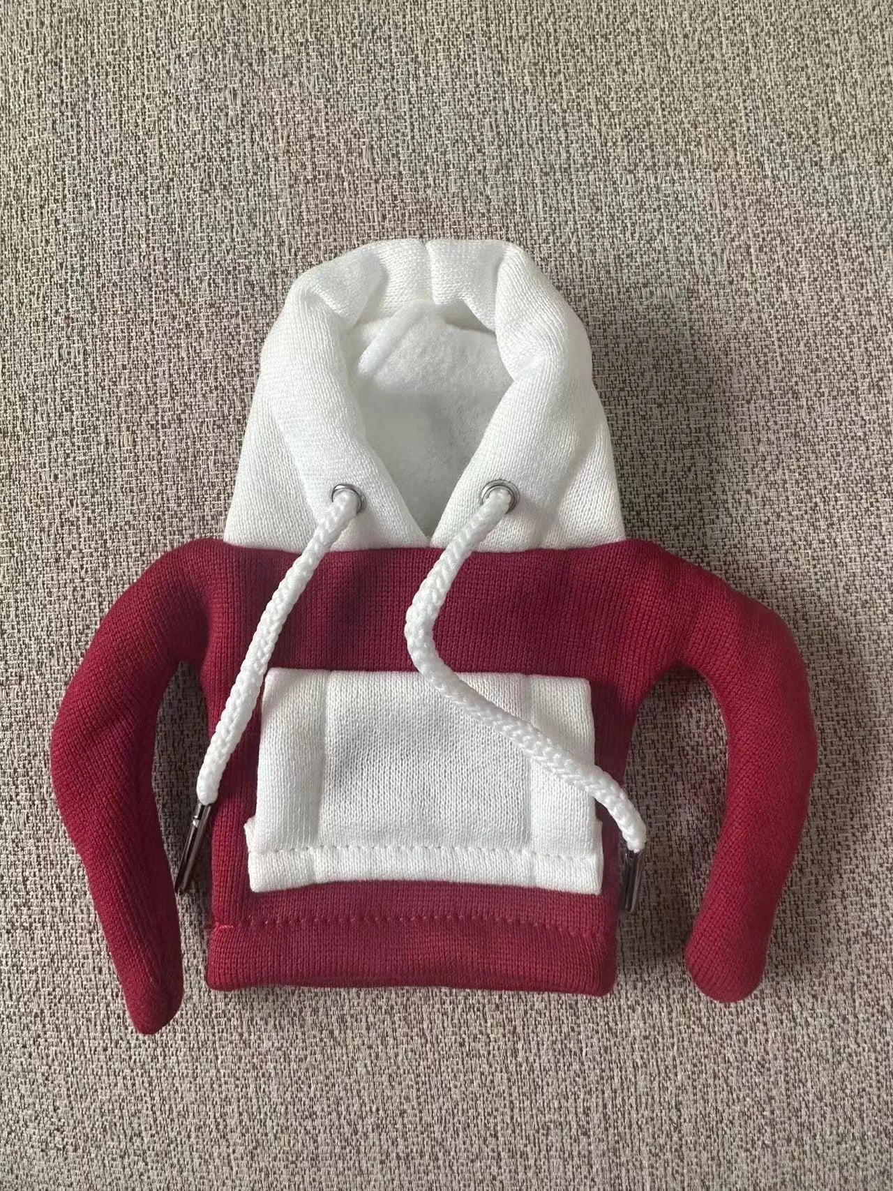 Red and white Christmas-themed polyester hood cover for a car gear shift lever.