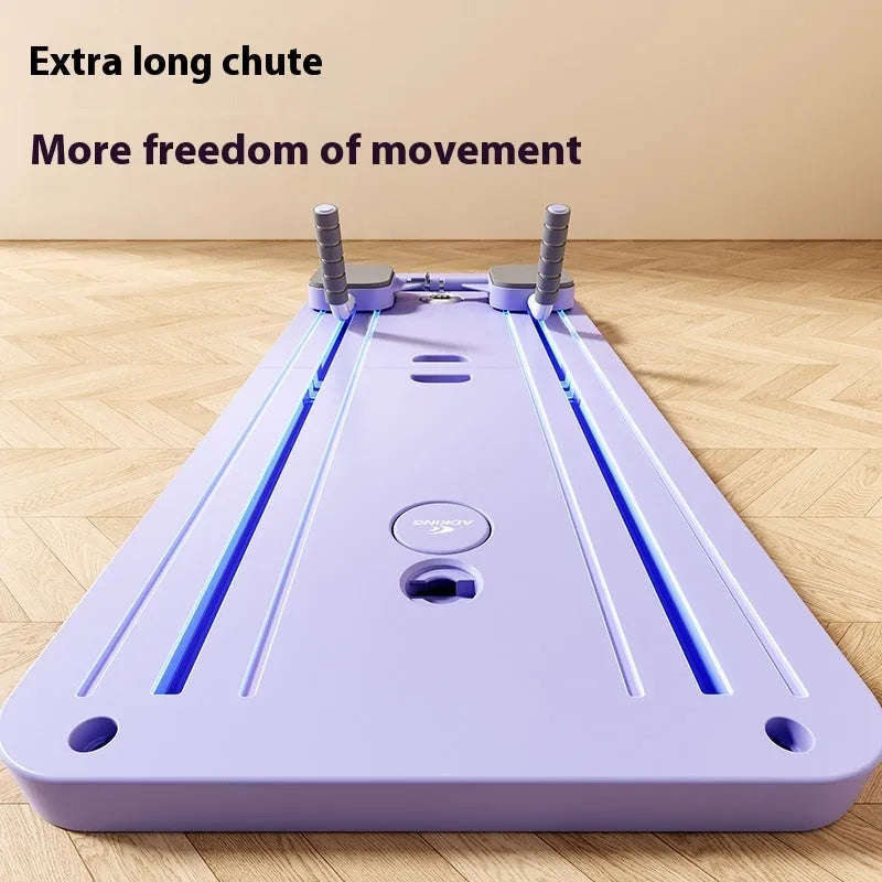 Standard purple automatic rebound abdominal wheel fitness board on floor demonstrating exercise position