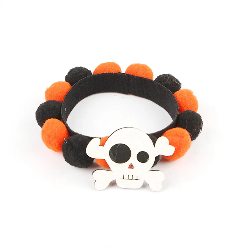 Halloween pet fur ball collar accessory for small dogs and cats in pumpkin, skull, and witch designs.