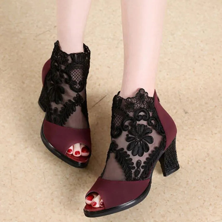Women's black floral lace gladiator sandals with square high heel and peep toe design