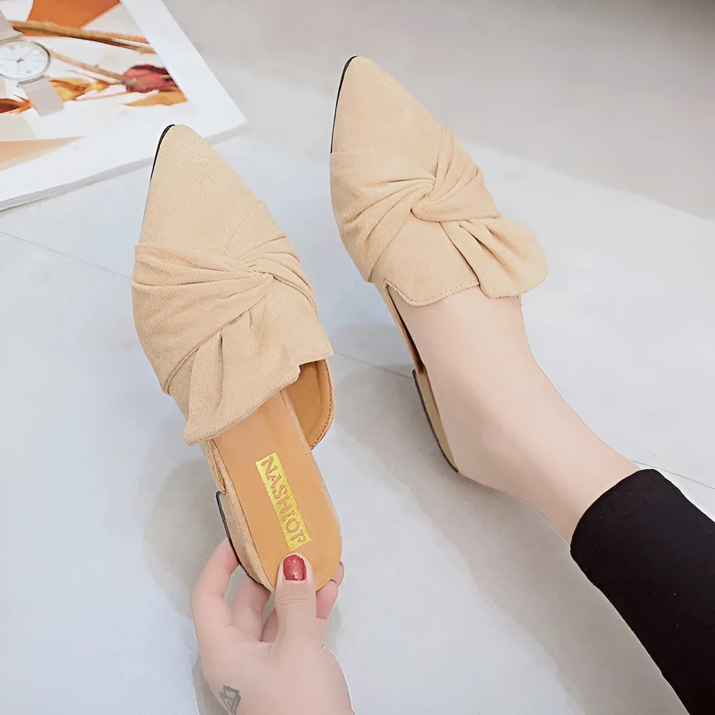 Suede pointed slippers with bow decoration, low square heel, black and beige colour options