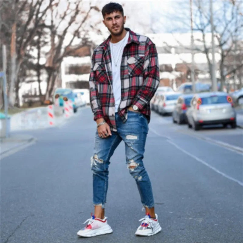 Men's distressed jeans with holes in deep blue colour showing cotton denim construction and sizing options from S to 3XL