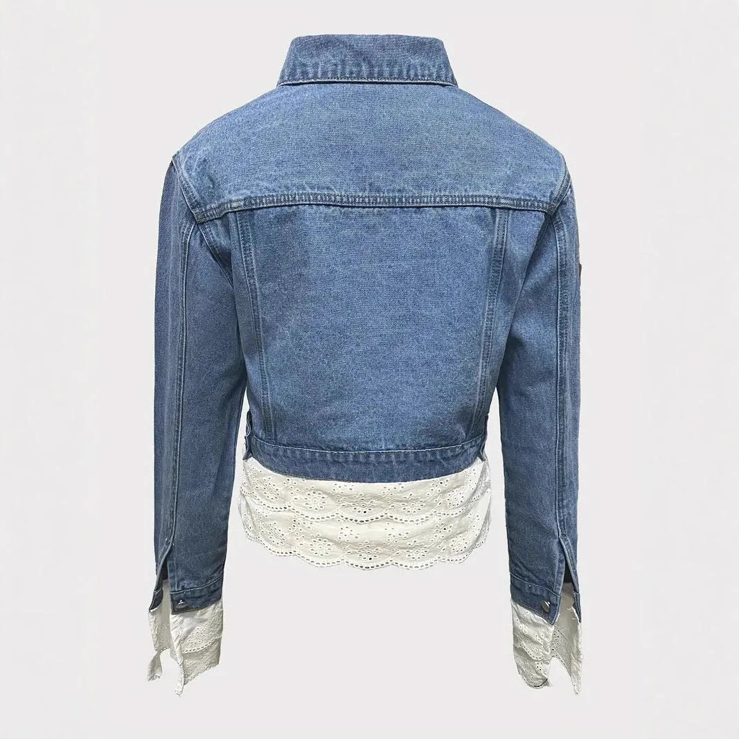 Blue women's denim jacket with decorative lace stitching on the front and sleeves.
