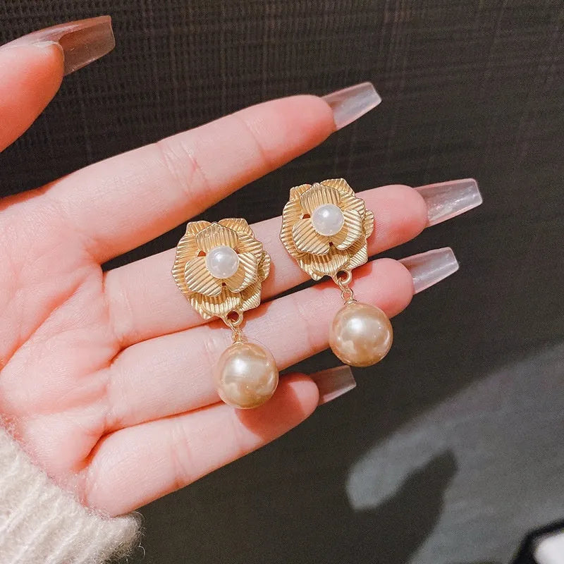 Gold electroplated Hong Kong style flower stud earrings with rose pearl opal centre and ice flower detailing