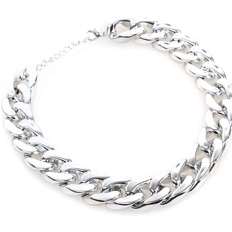 Geometric twisted chain dog collar in metallic colours showing adjustable buckle and chain links