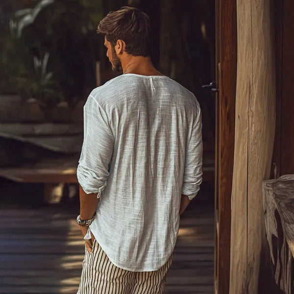 Beige long-sleeved V-neck t-shirt in slim fit made from hemp blend fabric.