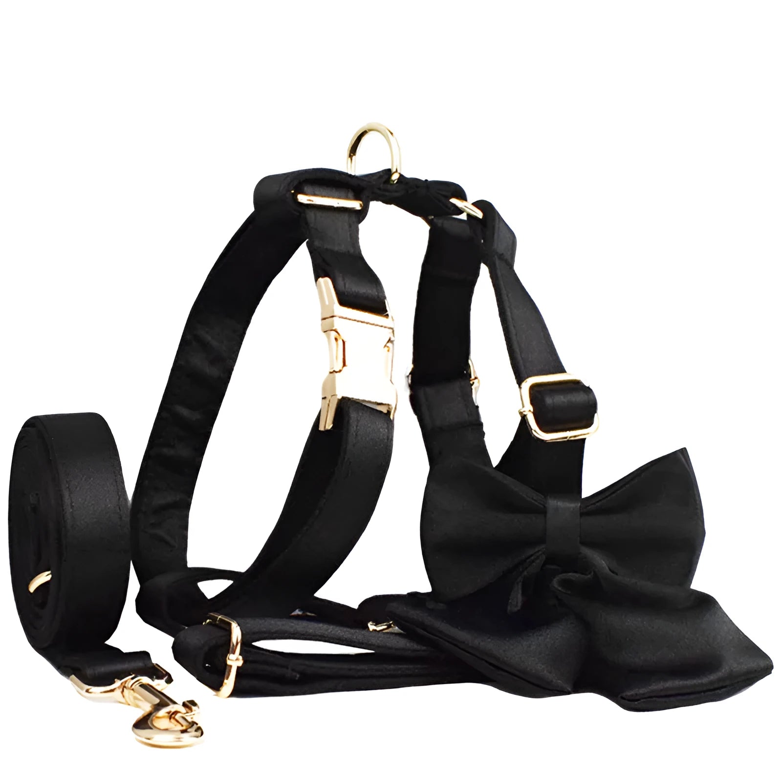 Cloth dog harness set with leash, red bow tie, and blue reflective safety vest laid out on a white background.