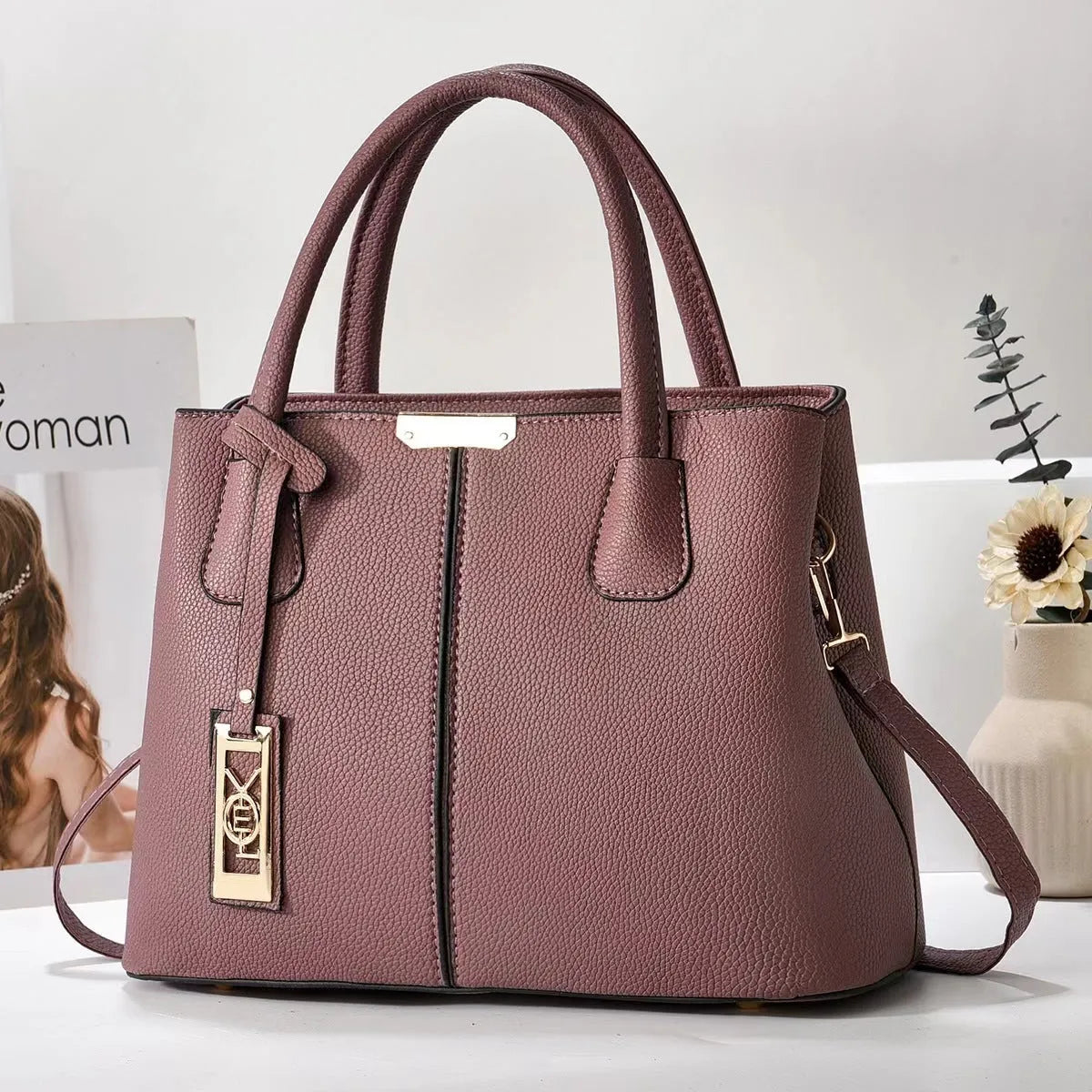 Soft PU fashion handbag with leather shoulder strap in horizontal square shape
