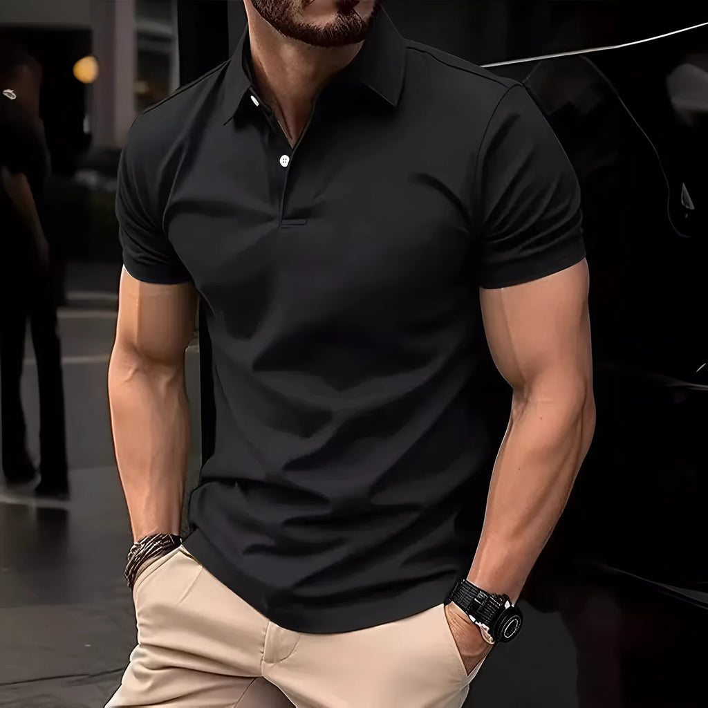 Men's slim fit button-front short sleeve casual shirt in a solid colour on a hanger.