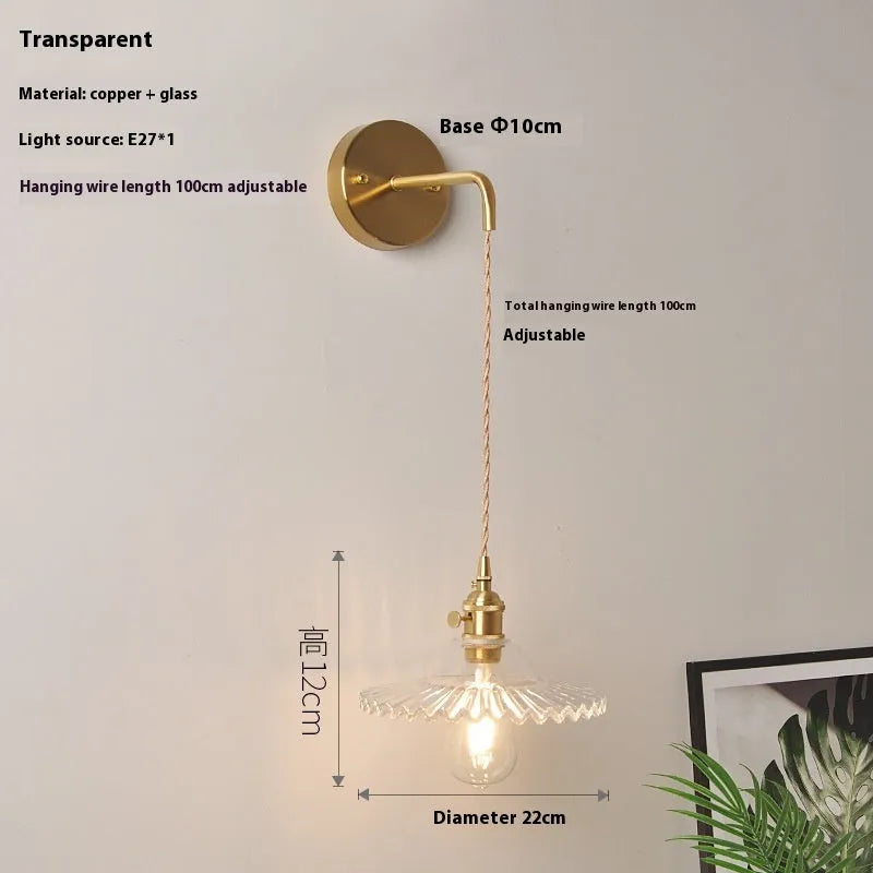 Retro copper lotus wall lamp with glass shade in choice of six colours, suspended from a wall