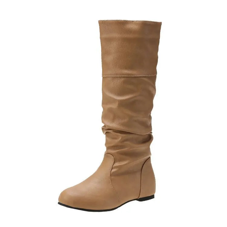 Women's black flat heel long slip-on boots with a round toe and high cylinder length.