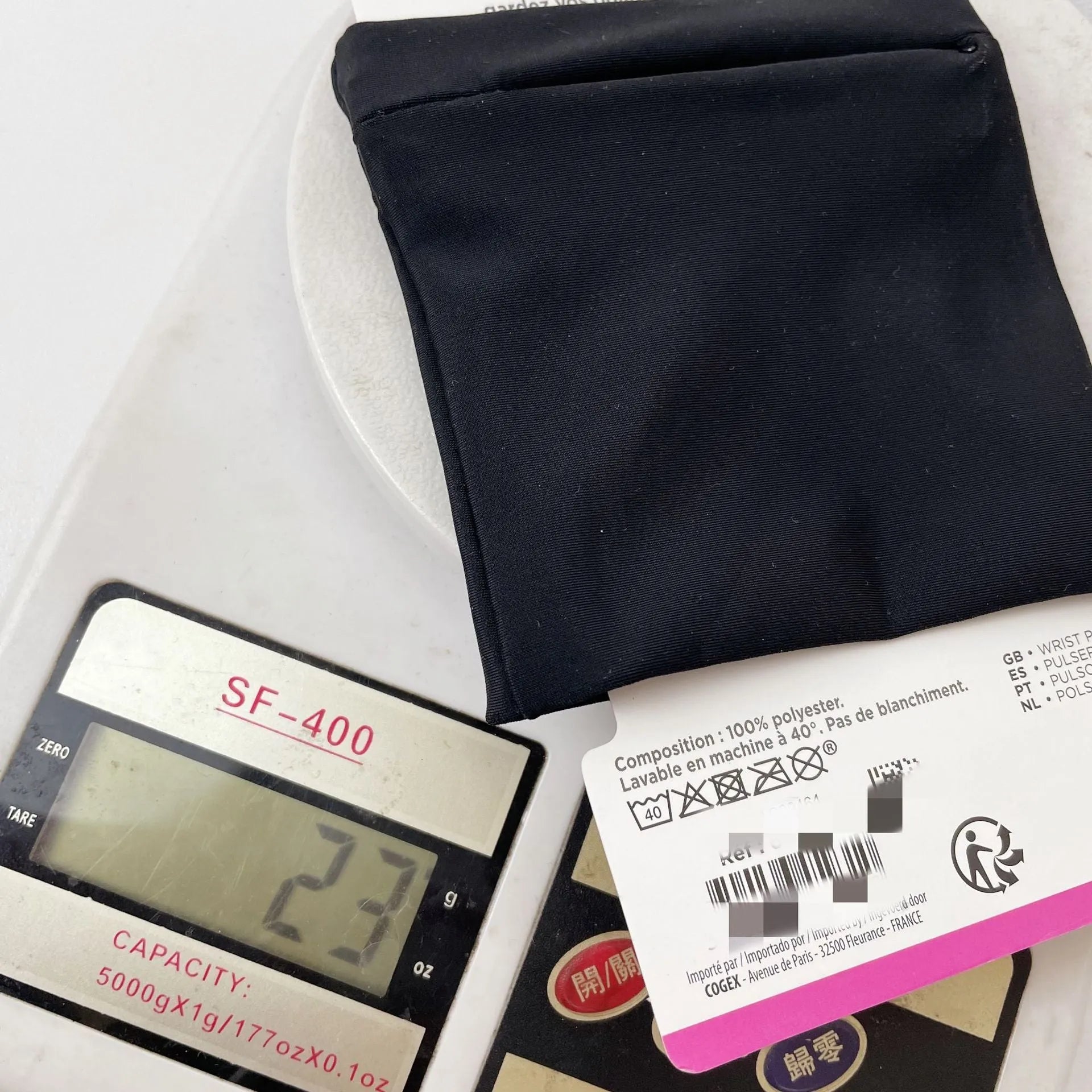 Camping fitness arm wallet wrist bag measuring 10 by 10.5 centimetres.