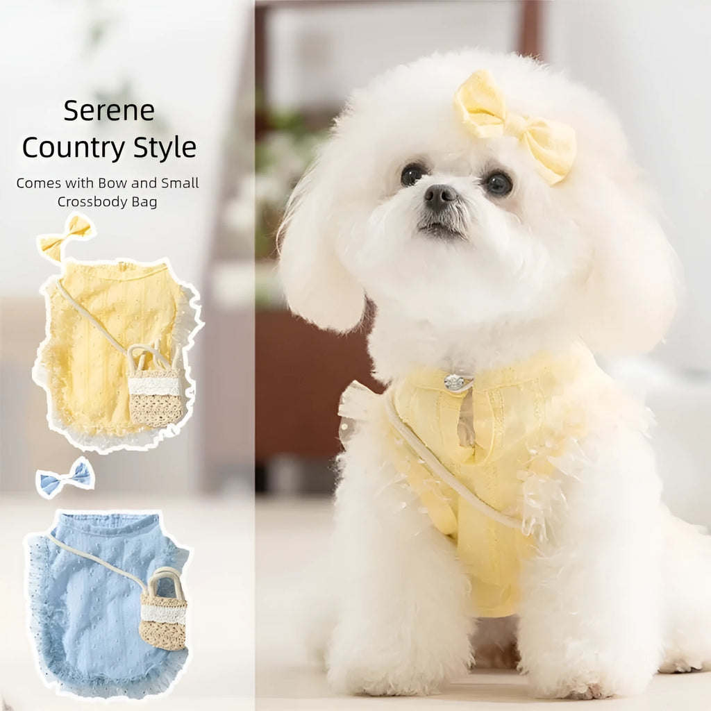 Small dog wearing two-tone blue country costume with ruffles, matching bow, and small woven crossbody bag