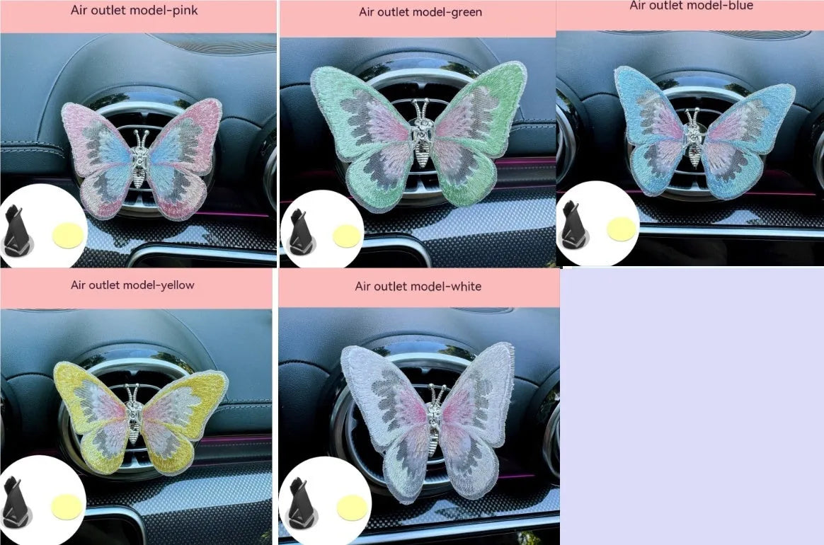 Moving embroidery butterfly decoration on car centre console air vent in pink fabric