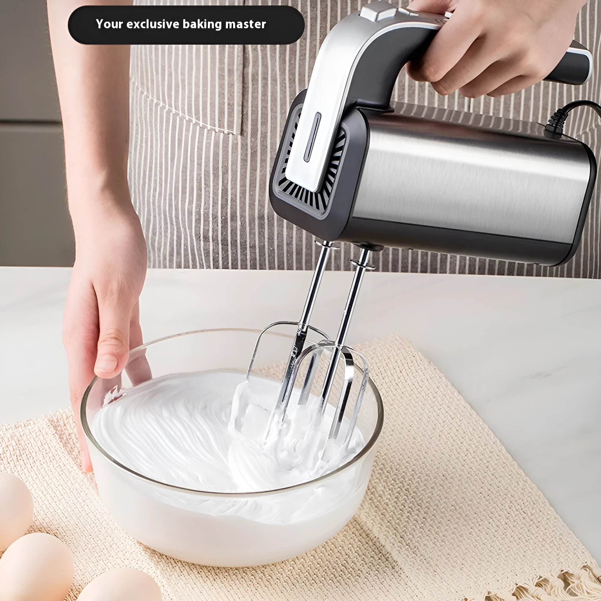 Silver mini electric handheld whisk with stainless steel beaters and 5-speed control