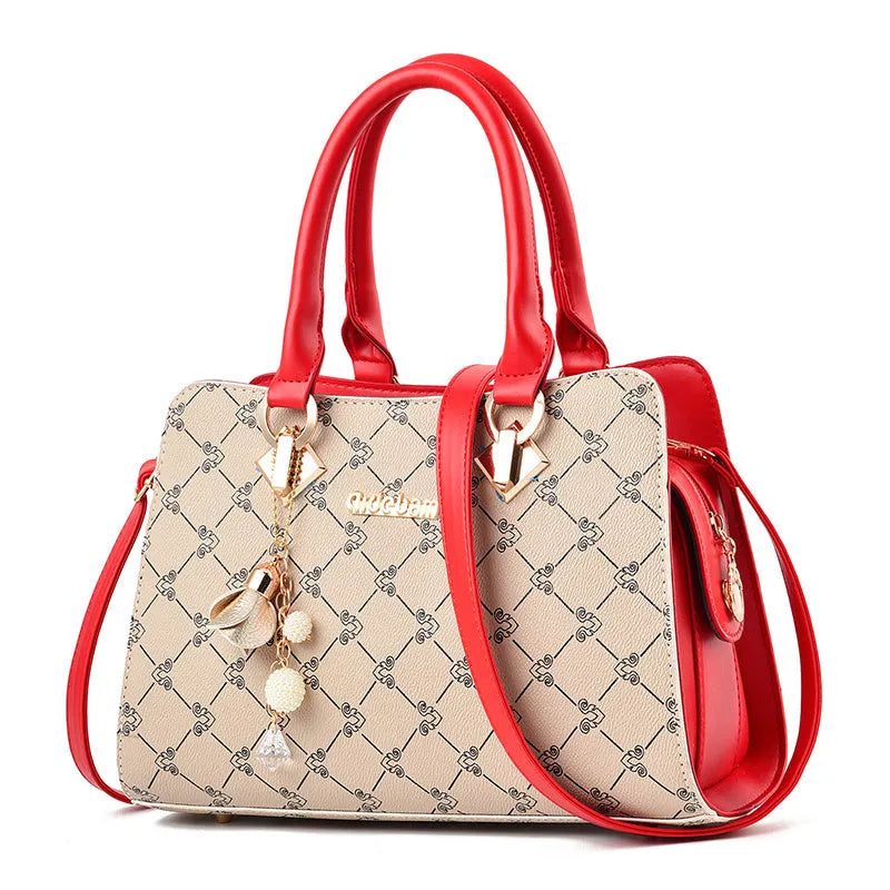 Women's geometric pattern print messenger bag in PU leather with zipper closure and internal organisers.