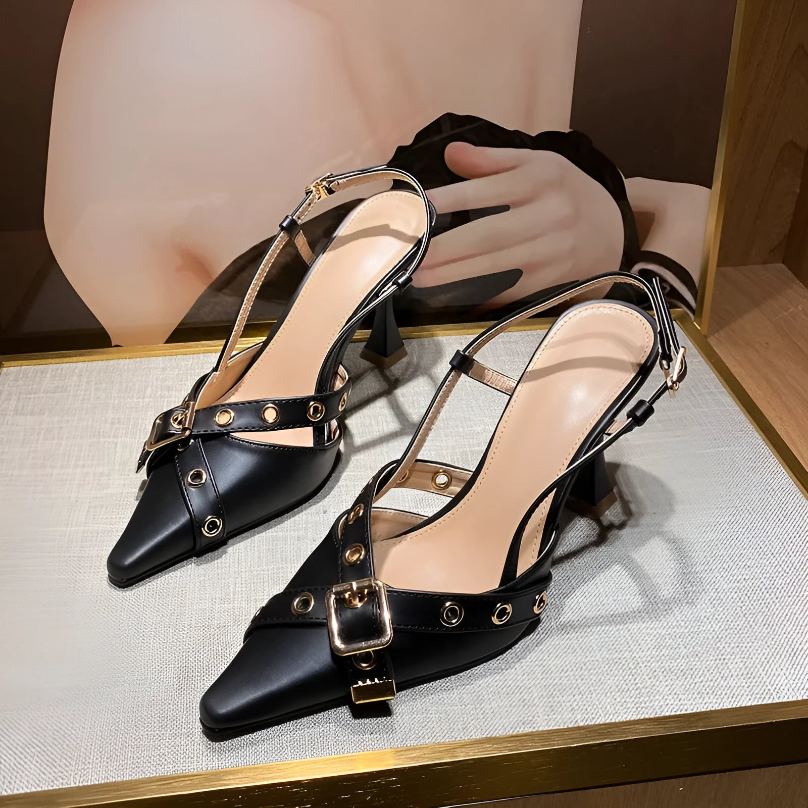 Women's mid heel sandals with patent leather cross strap and buckle closure in caramel colour