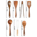 Wooden kitchen utensil set with seven pieces including spoons and spatulas in boxed presentation
