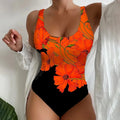 Women's 3D printed one-piece swimsuit in Lycra fabric, shown in orange red, sky blue, and purple colours.
