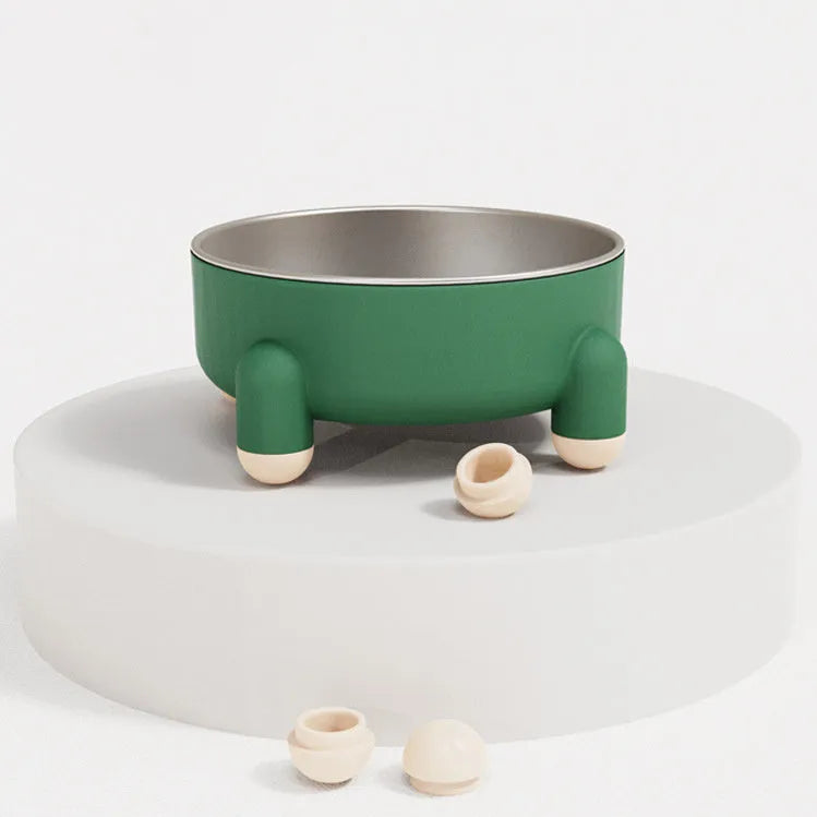 Green stainless steel pet bowl with a high foot and non-slip silicone base on a floor