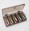 Set of five small silver fish lure pencil baits with double hooks and a tackle box