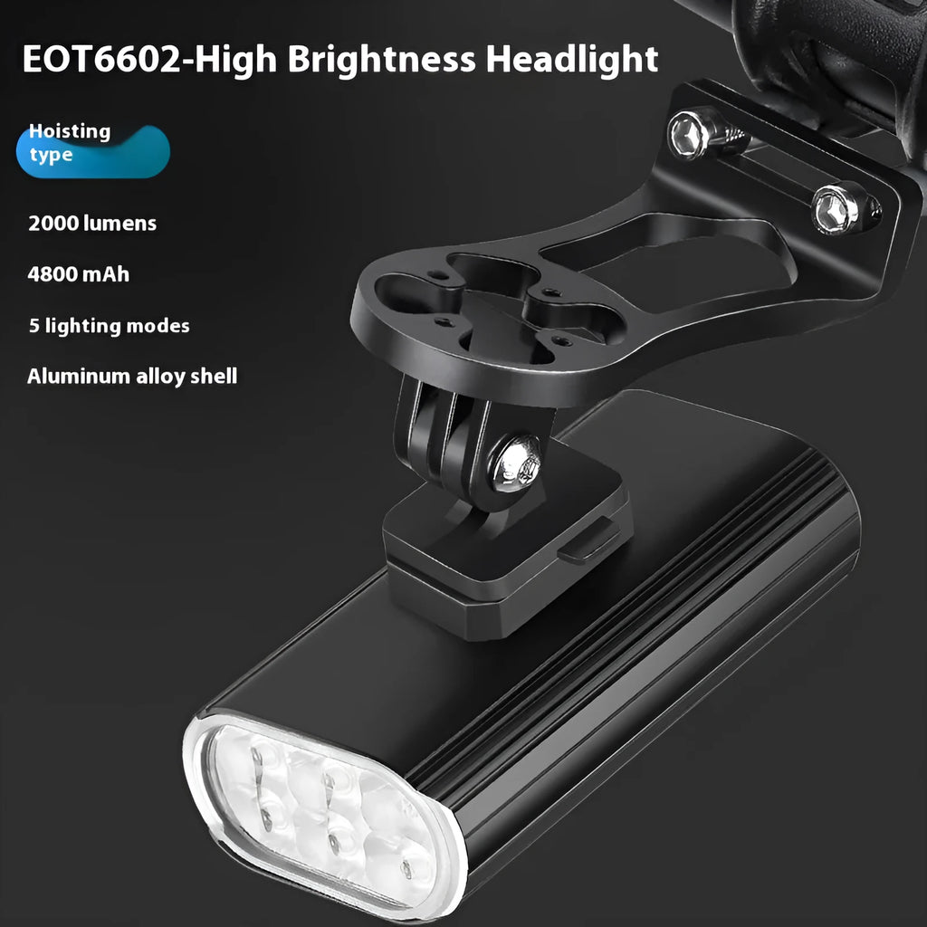 Aluminium alloy bicycle front light with 6 LEDs, USB Type-C port, and quick-release mount on handlebars.