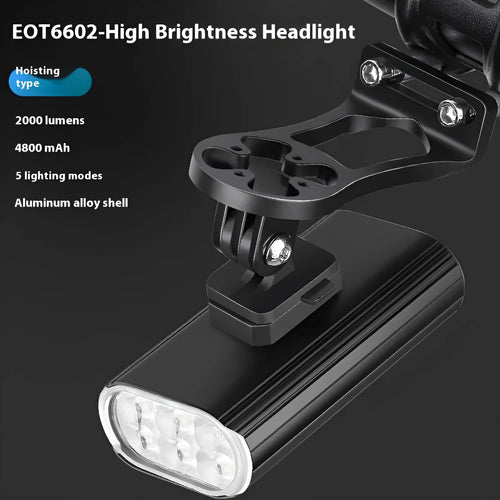 Aluminium alloy bicycle front light with 6 LEDs, USB Type-C port, and quick-release mount on handlebars.
