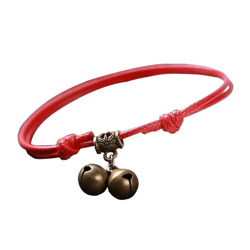 Adjustable nylon dog collar with brass buckle or bell in black, red, or coffee rope colour.